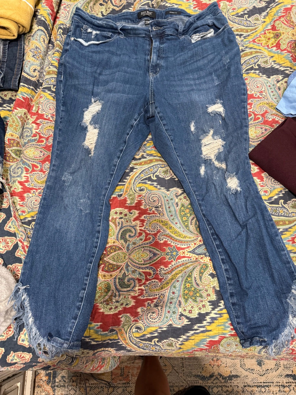 Distressed Blue Women's Jeans with Frayed Hem